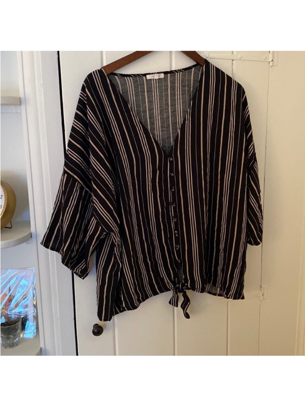 Maurices Black and Cream Striped V-Neck Button Tie Hem Top